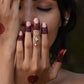 Handcrafted Nuvi Jewels Rasa Mid Ring in 92.5 silver featuring adjustable jadau motif with pearl drop