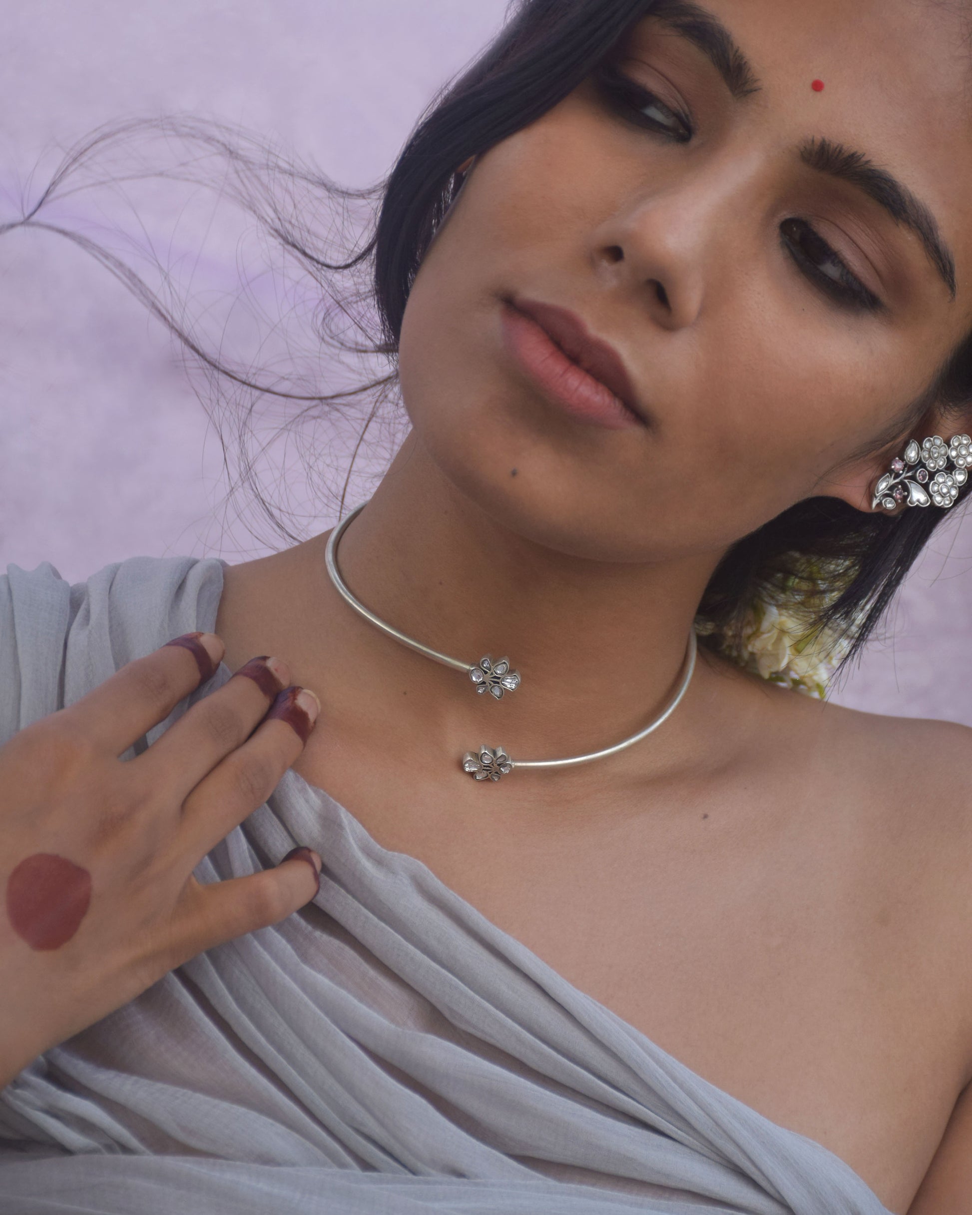 Statement Nuvi Jewels Rasini Hasli in 92.5 silver gold plated featuring paired floral motif design