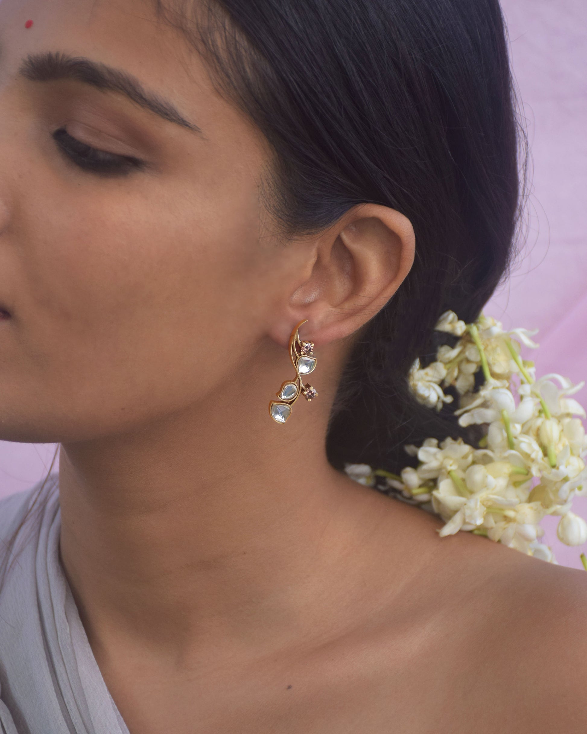 “Nuvi Jewels designer Rohini Earrings in 92.5 silver with delicate flower motifs and intricate handcrafted design