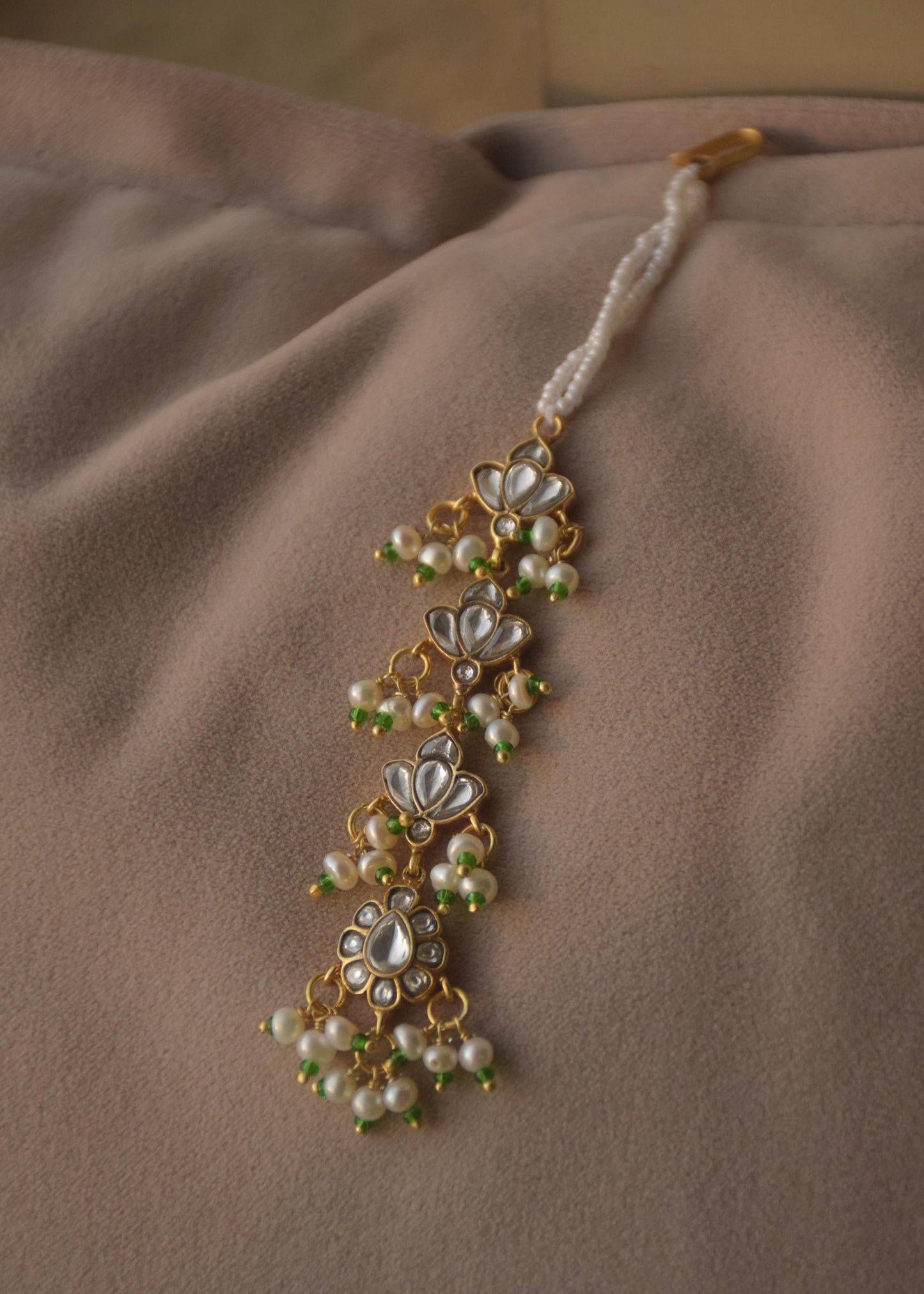 Nuvi Jewels designer maang tikka crafted in 925 sterling silver with heritage jadau craftsmanship crafted in pure 92.5 sterling silver
