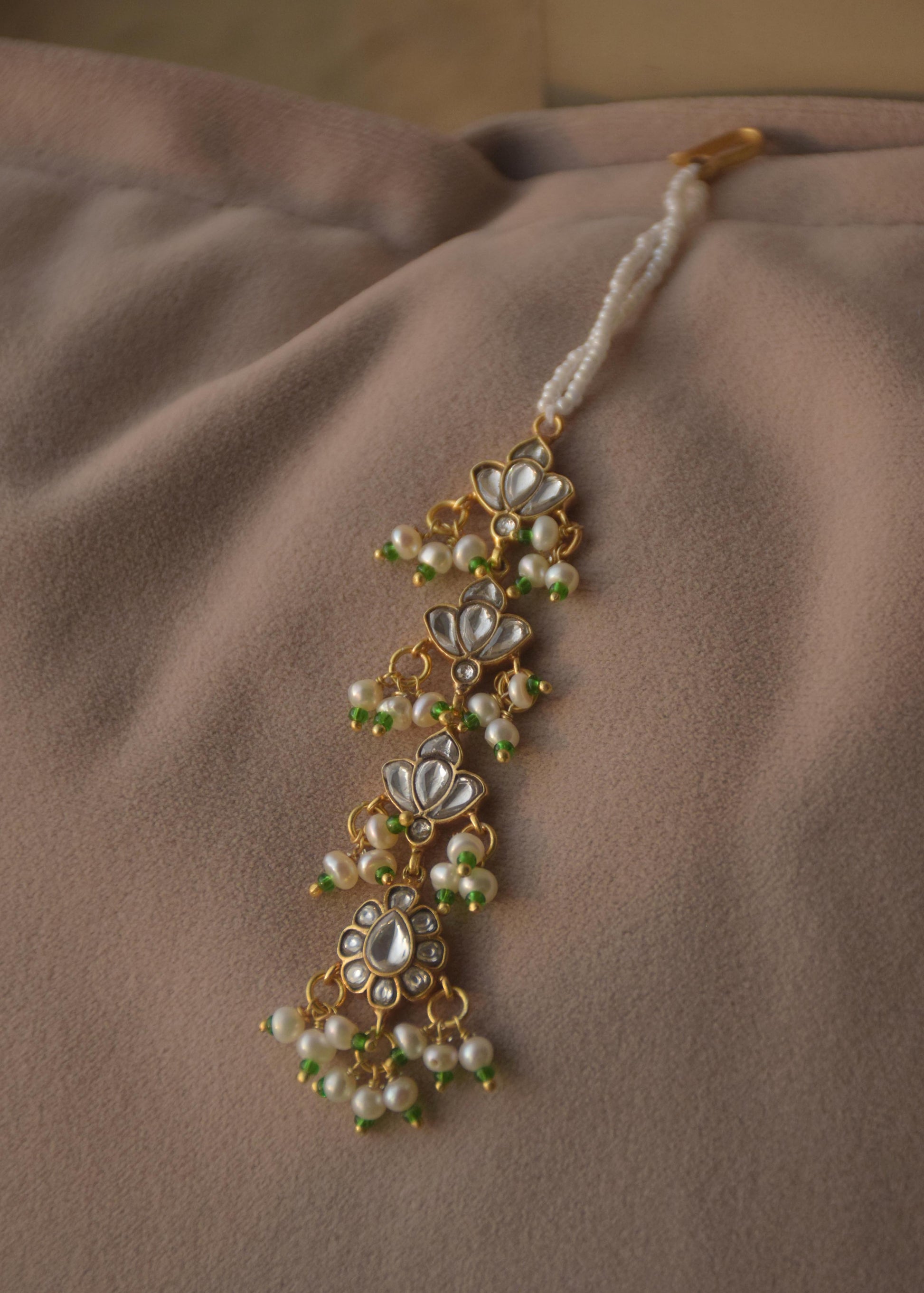 Nuvi Jewels designer maang tikka crafted in 925 sterling silver with heritage jadau craftsmanship crafted in pure 92.5 sterling silver
