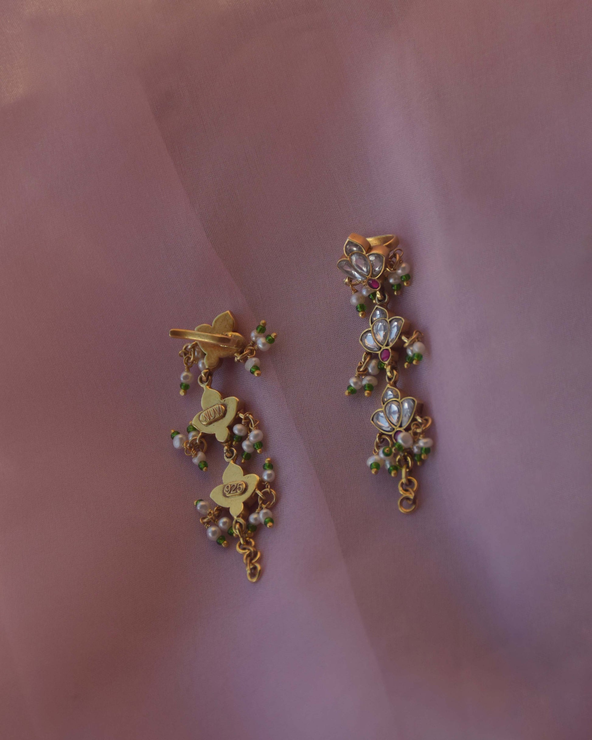 Handcrafted Nuvi Jewels Dhanak Kaanchain in 92.5 silver featuring three floral jadau-studded motifs and adjustable kadis