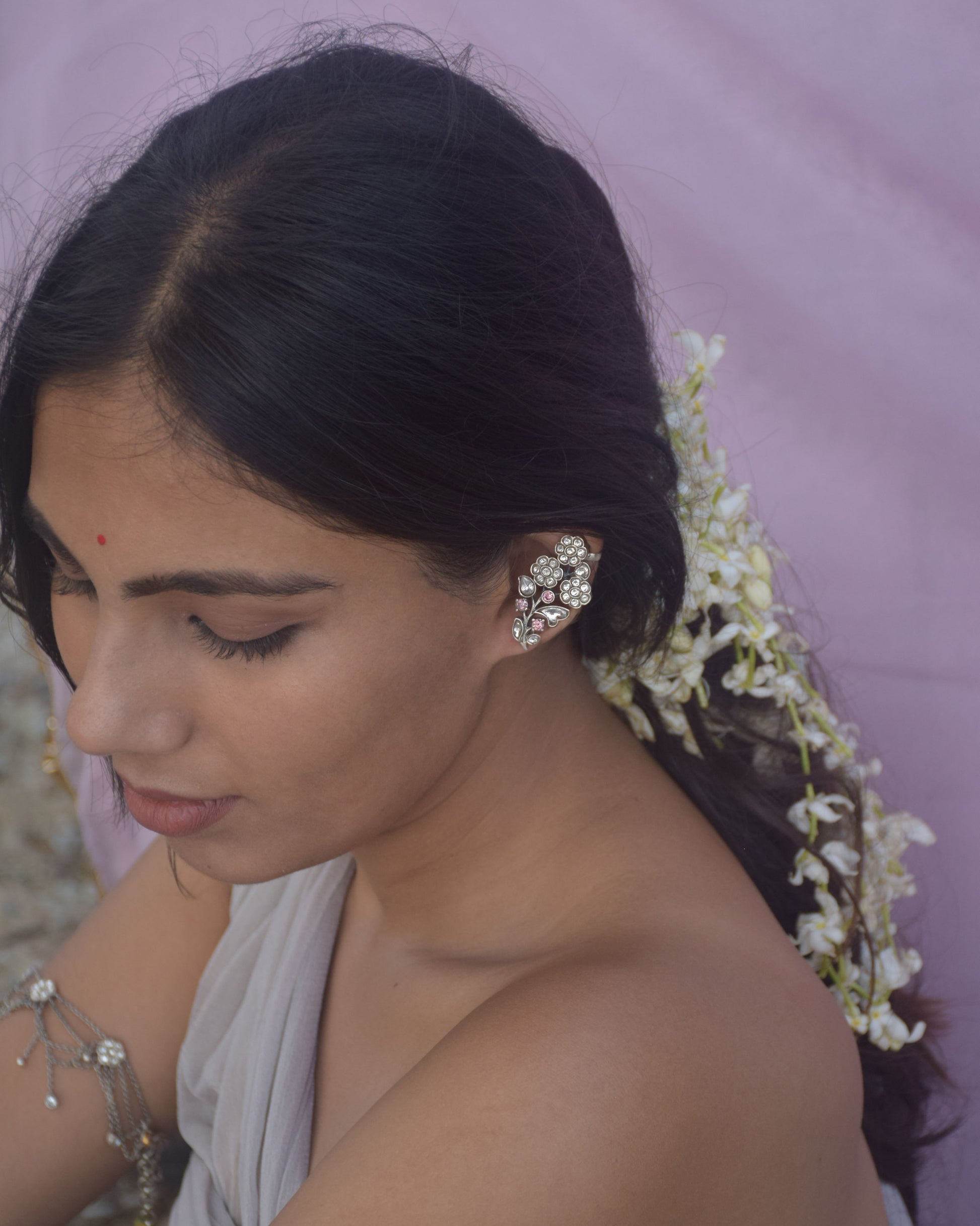 Handcrafted Nuvi Jewels Laasya Earcuffs in 92.5 silver gold plated featuring intricate floral motifs and secure screw clip