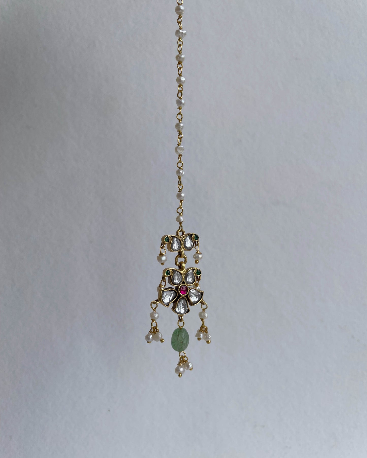 Nuvi Jewels 925 sterling silver gold plated jadau mangtikka with freshwater pearl detailing