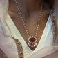Elegant Nuvi Jewels polki pendant featuring a pink glass stone in sterling silver with pearl chain