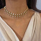 Handcrafted Nuvi Jewels choker in 925 sterling silver featuring drop-shaped Belur polki stones and green center accent