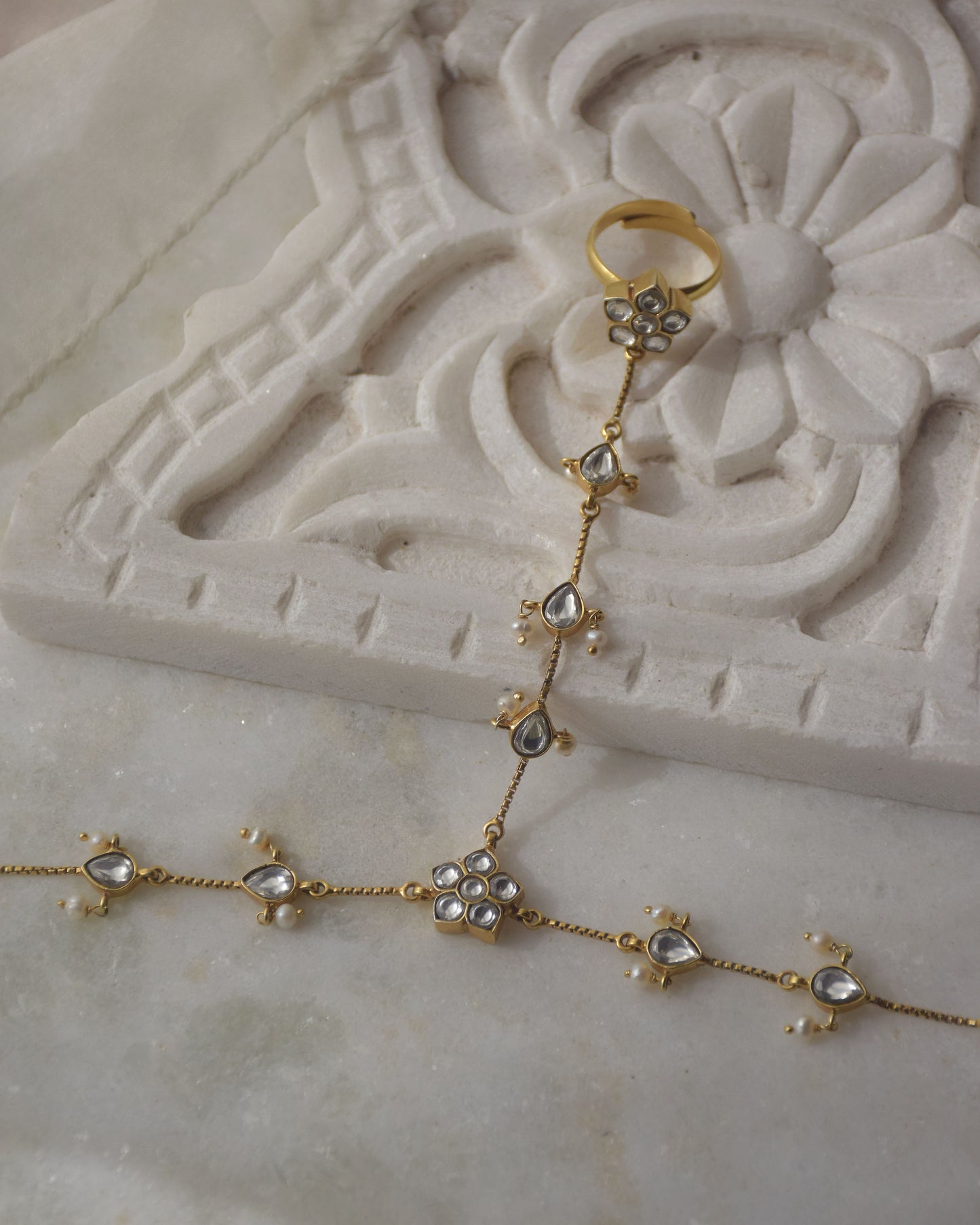 uxury kundan jadau haathphool from Nuvi Jewels made in 92.5 silver with gold plated detailing