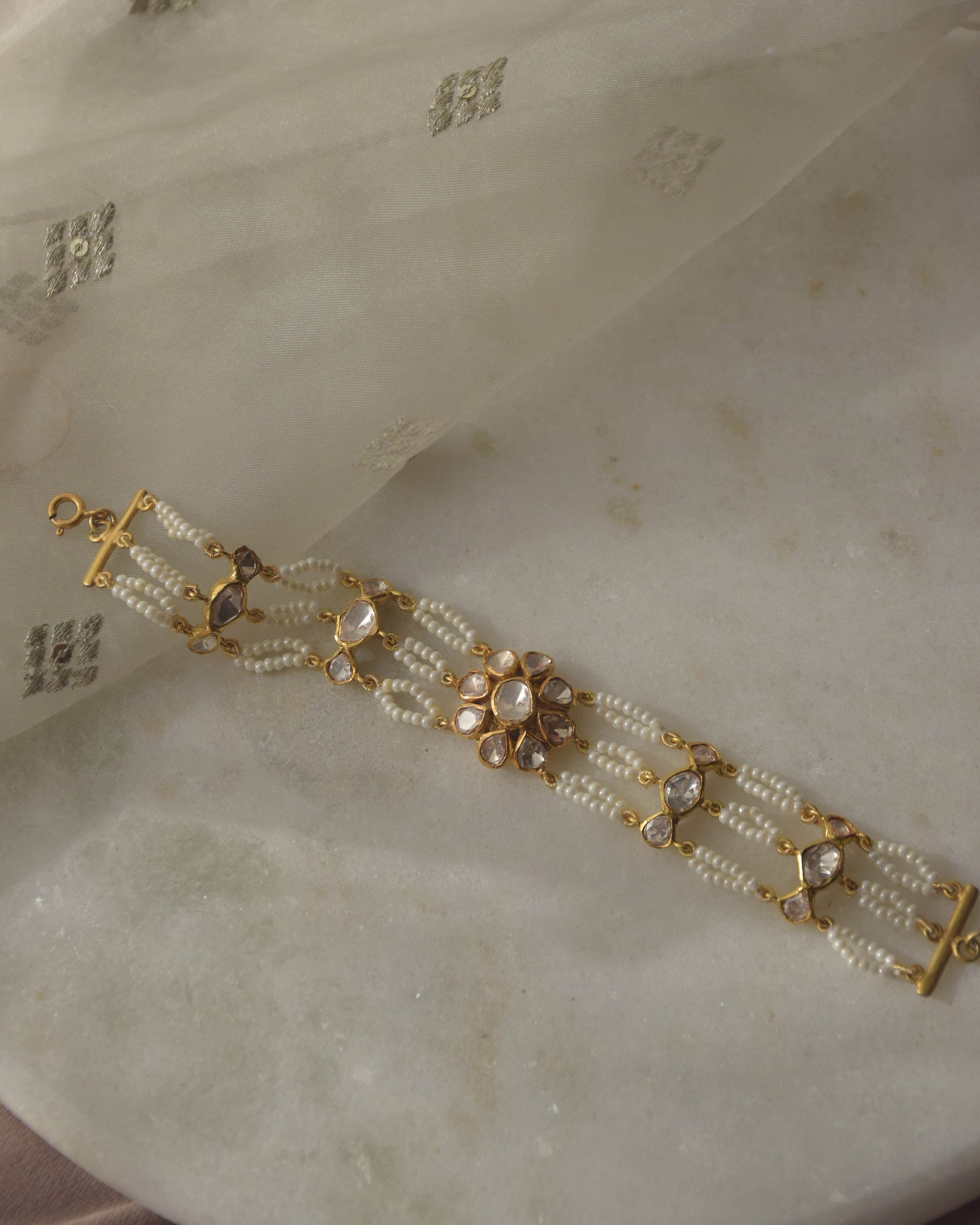 Nuvi Jewels designer bracelet in 92.5 silver featuring moissanite stones and pearls