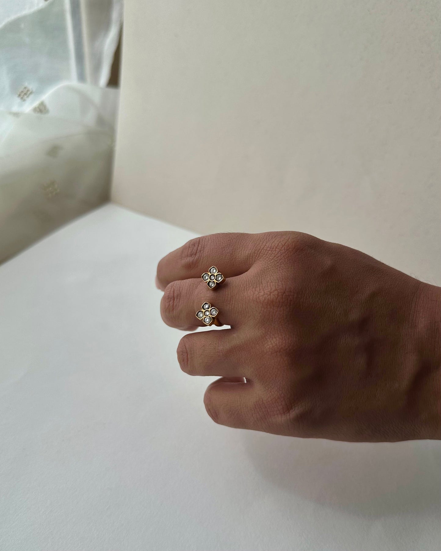 “Nuvi Jewels heritage inspired jadau ring featuring traditional setting in gold plated silver