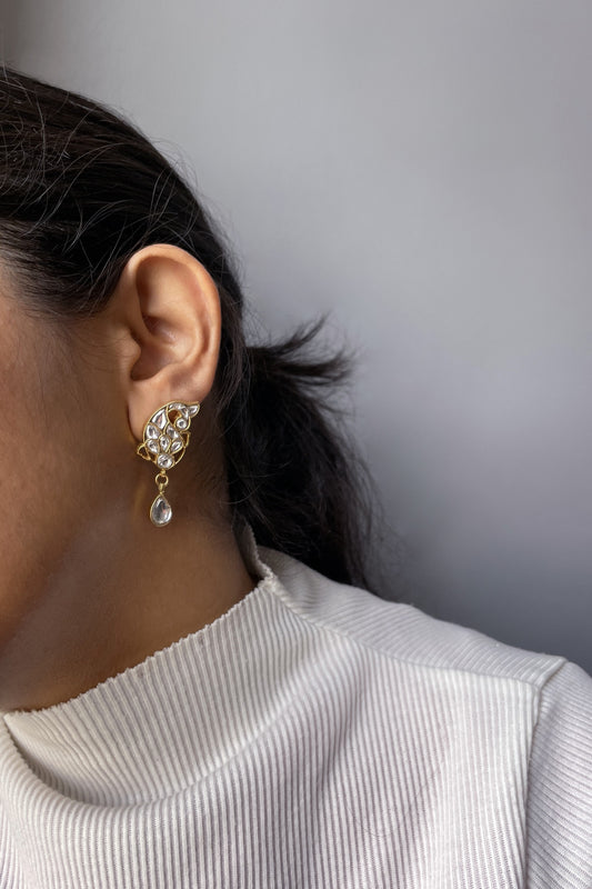 Handcrafted 925 silver Matsya Earrings with detailed fish design, sparkling Jadau stones, and droplet-shaped Jadau accent, perfect for festive or traditional Indian styling.