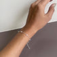Fine crafted Freshwater Pearl bracelet featuring intricate silver detailing and pearl accents