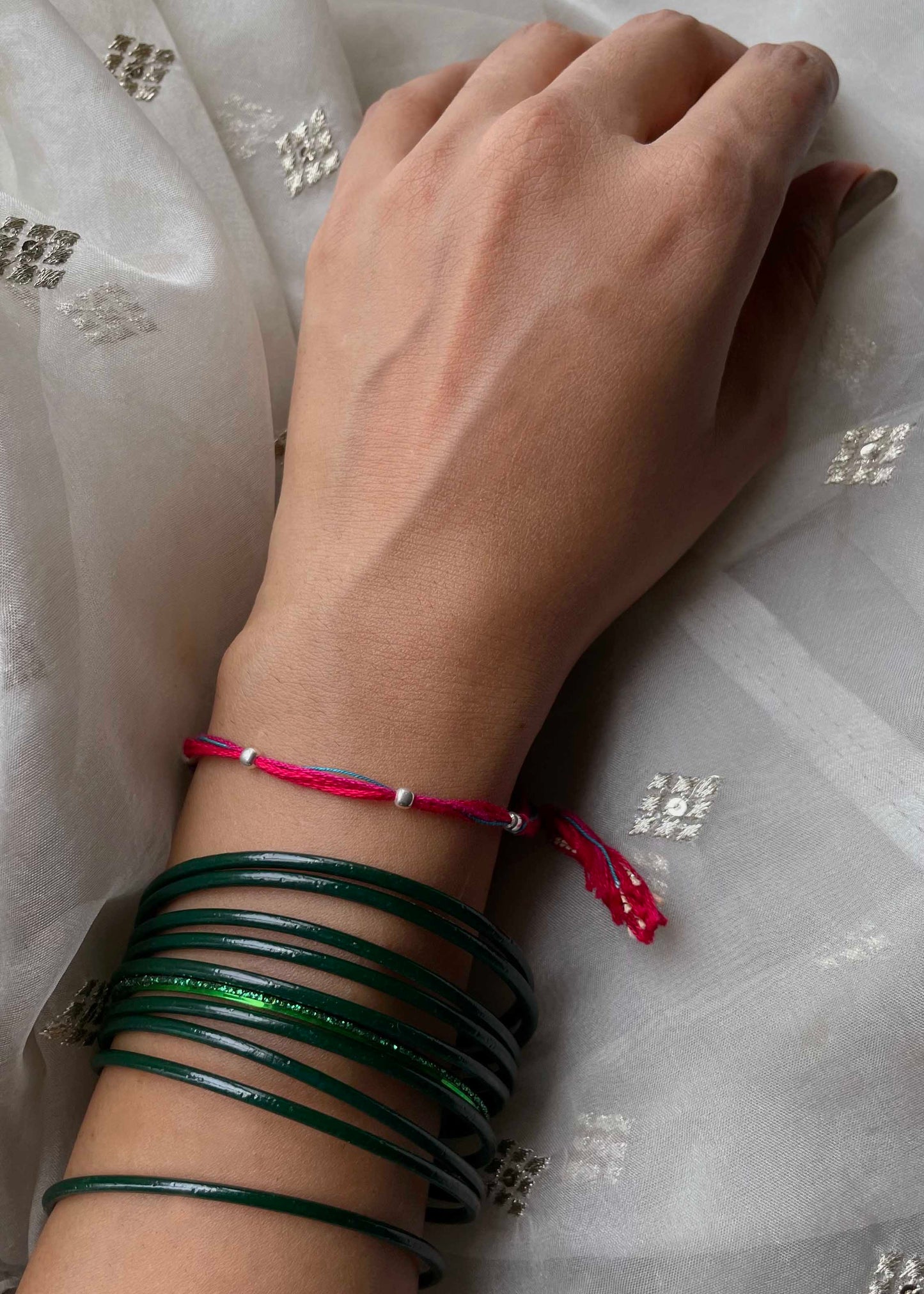 Handmade Bhabhi Bead themed 925 sterling silver rakhi with premium artisanal craftsmanship