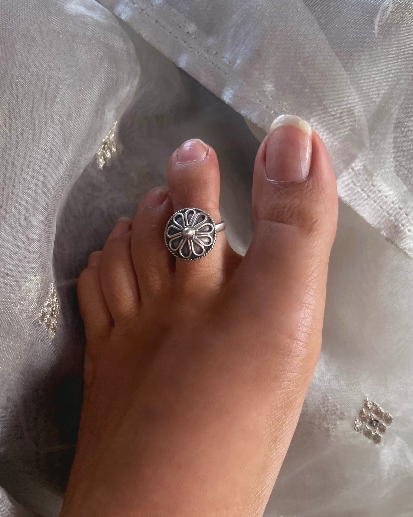 Beautiful sterling silver toe ring with timeless design aesthetic