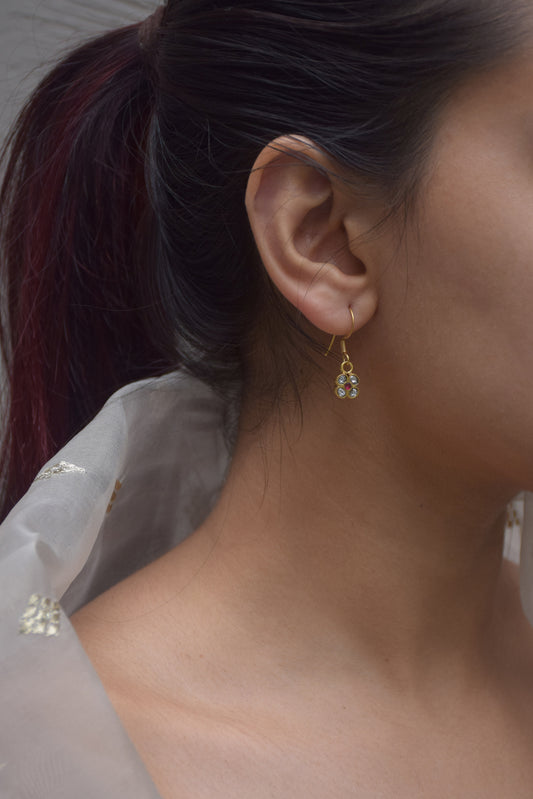 Raatrani Fish Hoop Earrings crafted in 925 silver with 22-carat gold plating, featuring a delicate Jadau stone.