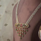 Rajlakshmi Jaisalmeri Necklace handcrafted in 925 silver, featuring a bold rectangular design with intricate Jadau stonework, accented by hanging drops with aventurine beads and pearls.