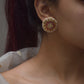 Nuvi Jewels Ranisa Earstuds, gold-polished 925 silver with round Jadau motif and delicate pearl framing, lightweight and elegant for ethnic and festive styling.