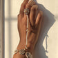 Ranisa Haathphool handcrafted in 925 silver featuring a finger ring connected to an elegant string of pearls.