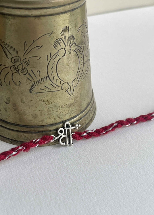 Discover the Shree 925 Sterling Silver Rakhi featuring spiritual symbolism and elegant handcrafted artistry by Nuvi Jewels.