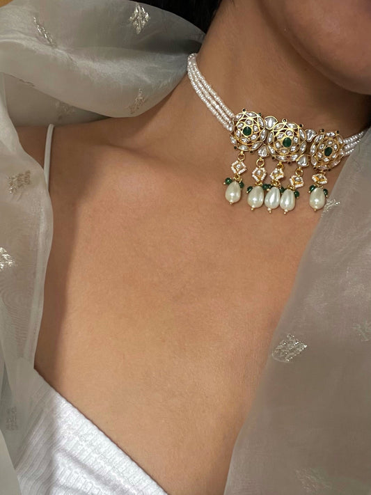 Shyama Choker handcrafted in 925 silver, featuring three round units adorned with Jadau stones, delicately draped along lines of pearls.
