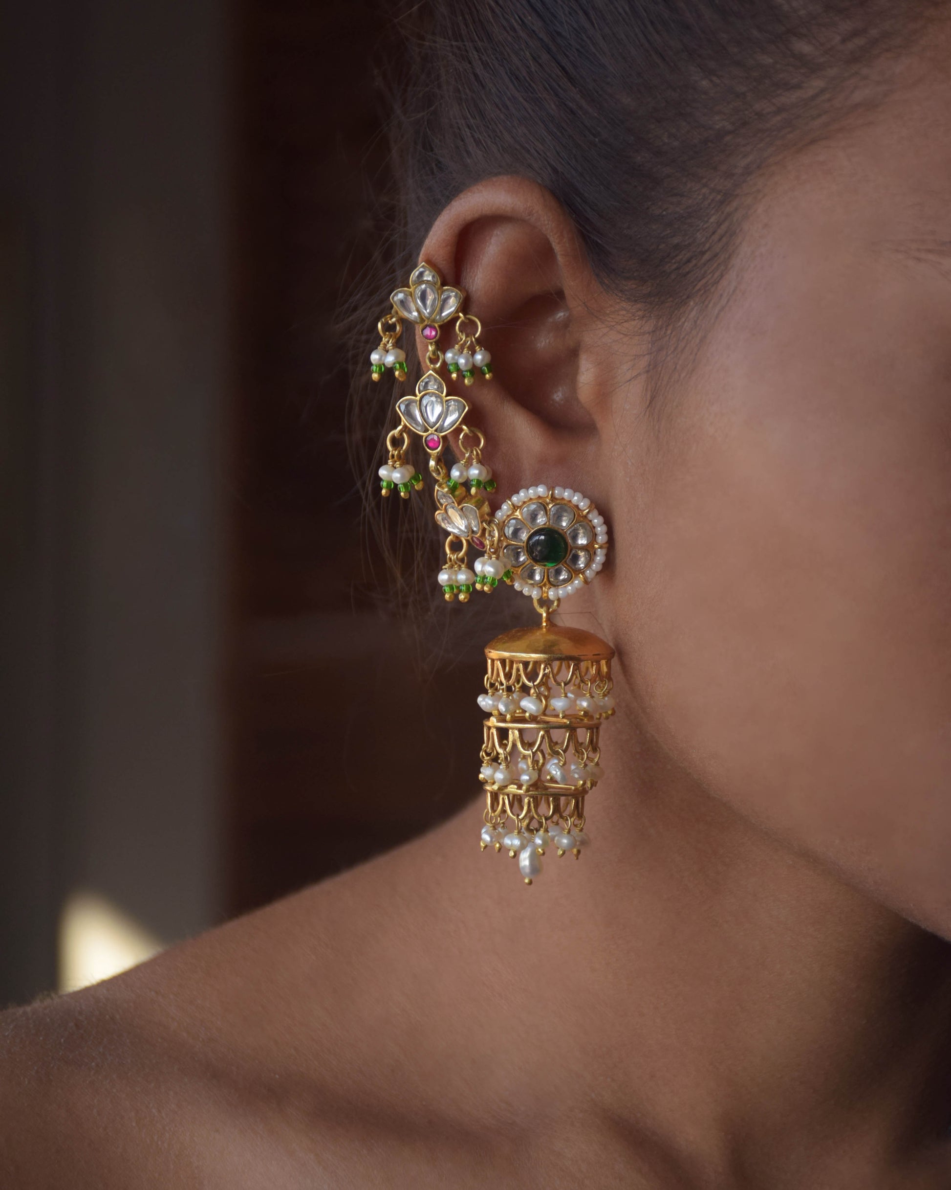 “Nuvi Jewels designer Dhanak Kaanchain in 92.5 silver with flowing design, three floral jadau motifs, and adjustable kadis