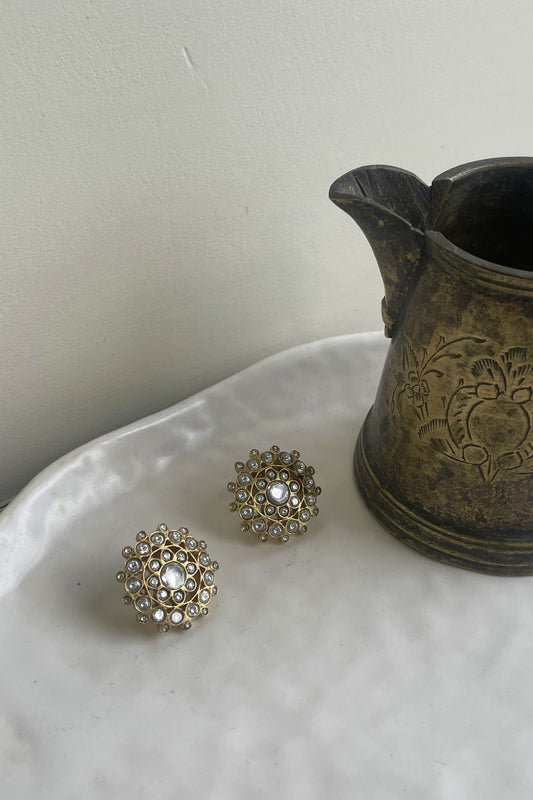 Tara 925 silver Jadau flower studs with intricate stonework.