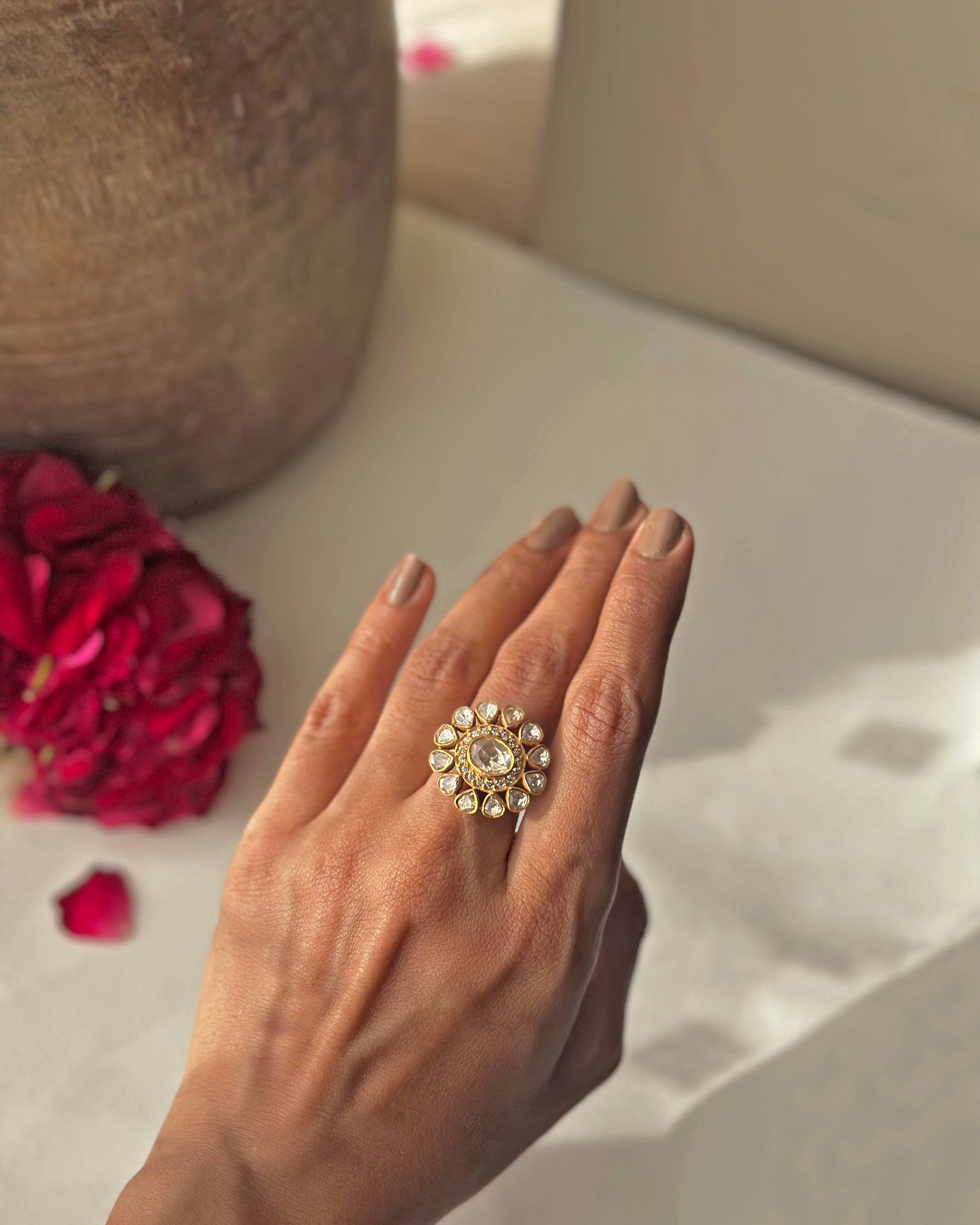 Handcrafted floral silhouette Taarika ring in 925 sterling silver with radiant uncut style polki stones and gold plating.